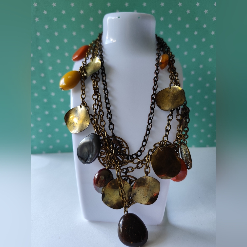 30" - 34" multi strand oranges gold tone necklace